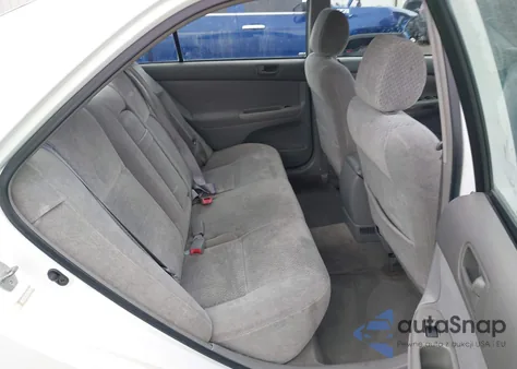 2003 Toyota Camry Le z USA, uszkodzony, nr VIN JTDBE32KX30141365